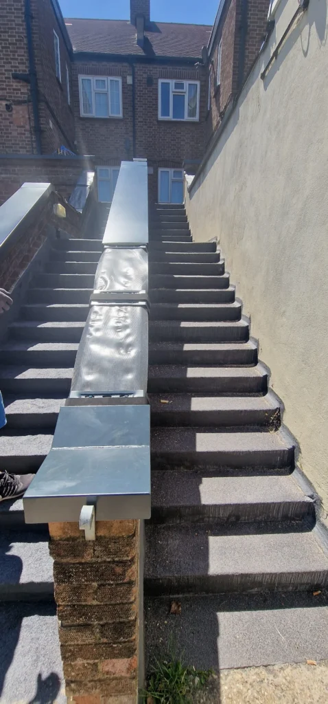 Aluminium coping installation on brick stair walls with a clean finish